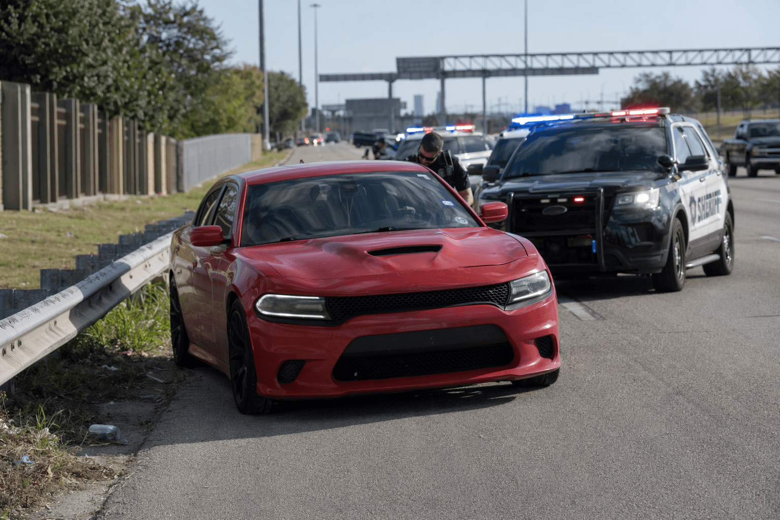 Harris County chase ends after Dodge Charger flees parking lot takeover
