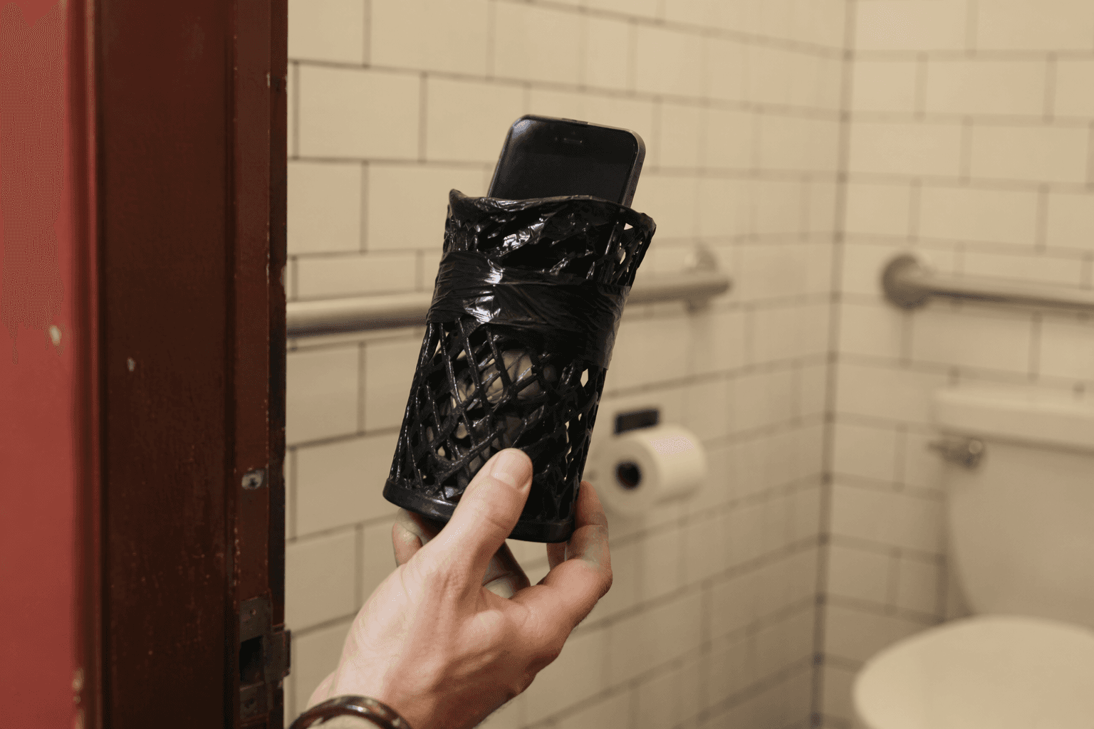 Houston man charged after hidden phone found in Heights cafe bathroom